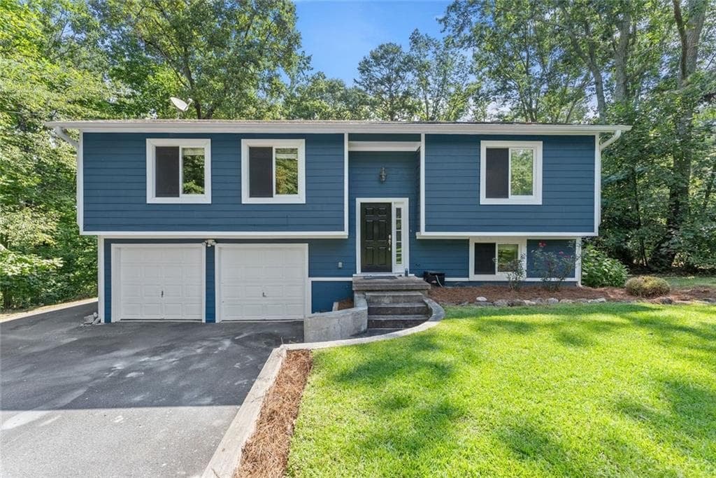 3 bedroom, 2 bathroom, 1,660 sq ft single family residence for sale at 1725 Gordon Road, Cumming, GA 30040 — photo 1 of 52
