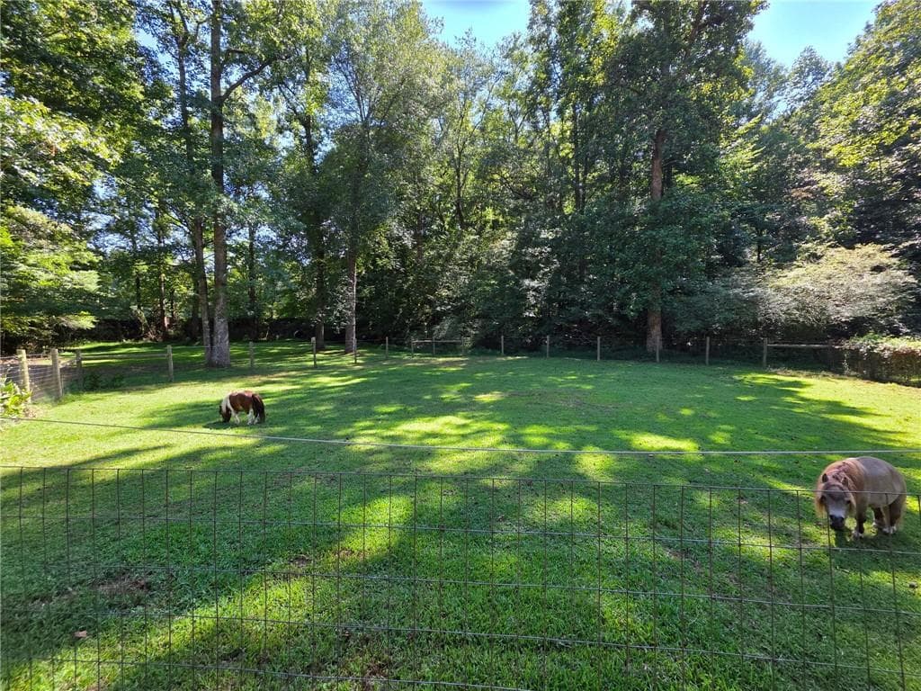 3 bedroom, 2 bathroom, 1,720 sq ft single family residence for sale at 403 N Stringer Road, Canton, GA 30115 — photo 3