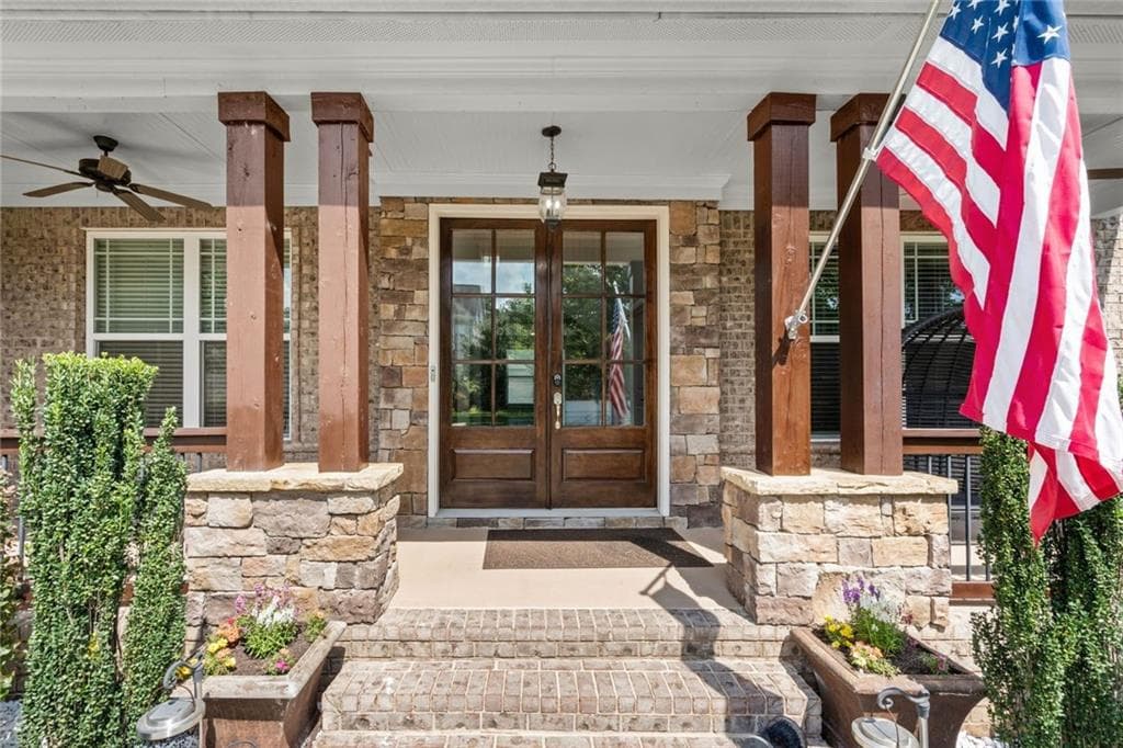 7 bedroom, 6 bathroom, 6,136 sq ft single family residence for sale at 4835 Magnolia Springs Drive, Cumming, GA 30040 — photo 2