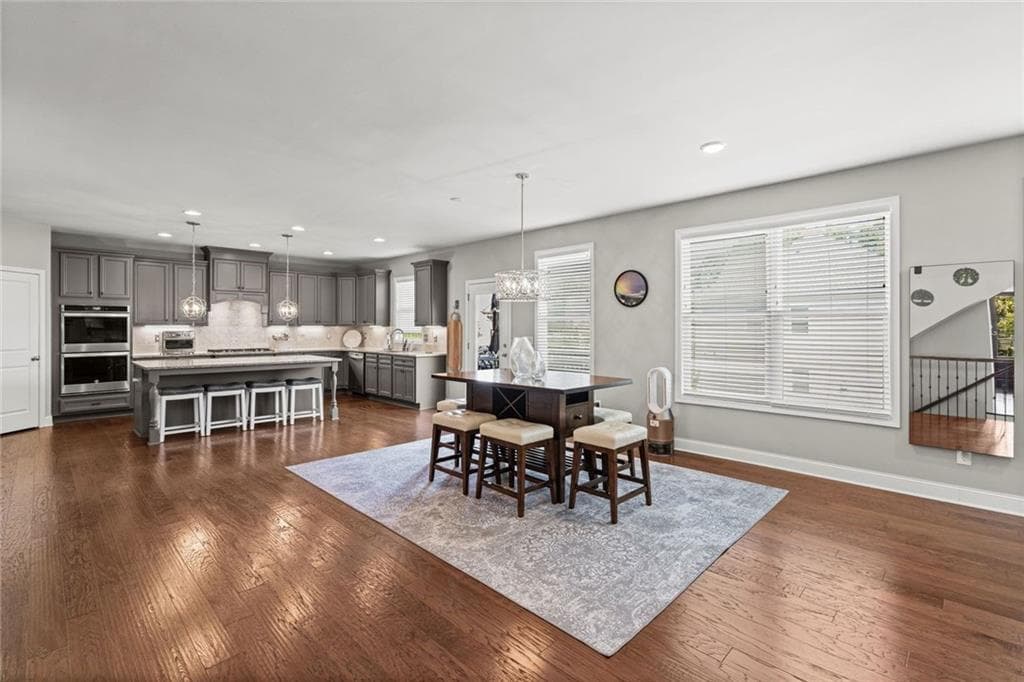 7 bedroom, 6 bathroom, 6,136 sq ft single family residence for sale at 4835 Magnolia Springs Drive, Cumming, GA 30040 — photo 10