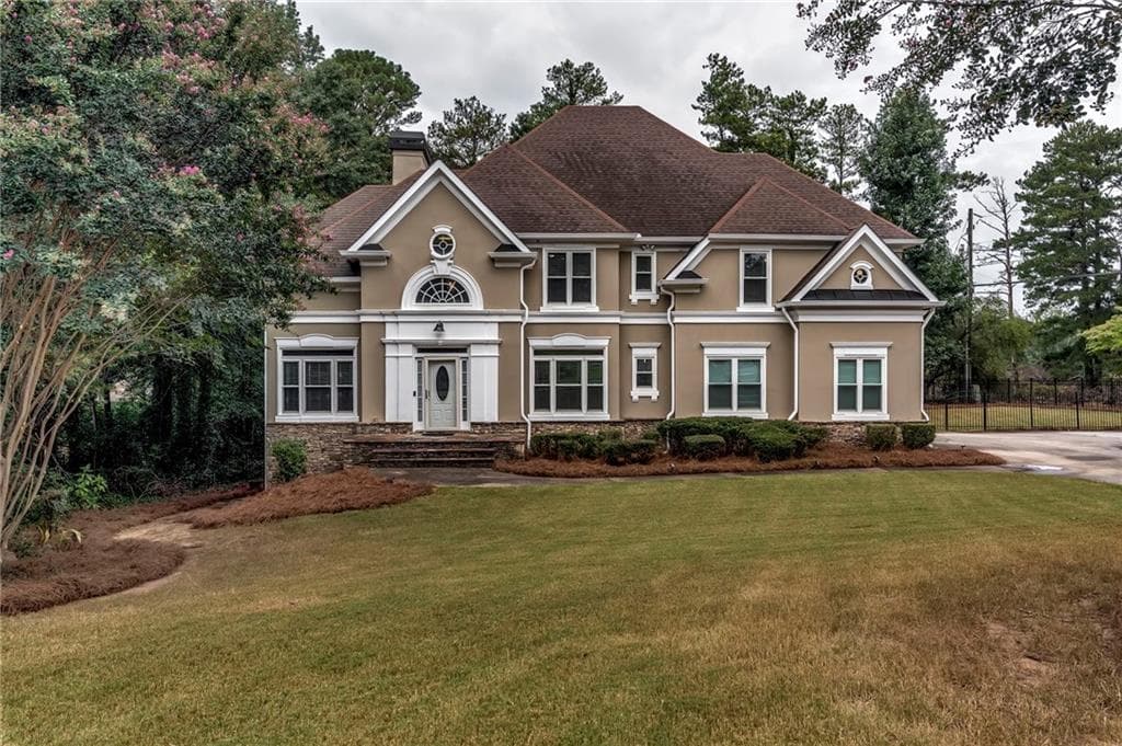 5 bedroom, 4 bathroom, 3,699 sq ft single family residence for sale at 807 Reagan Drive, Conyers, GA 30012 — photo 2
