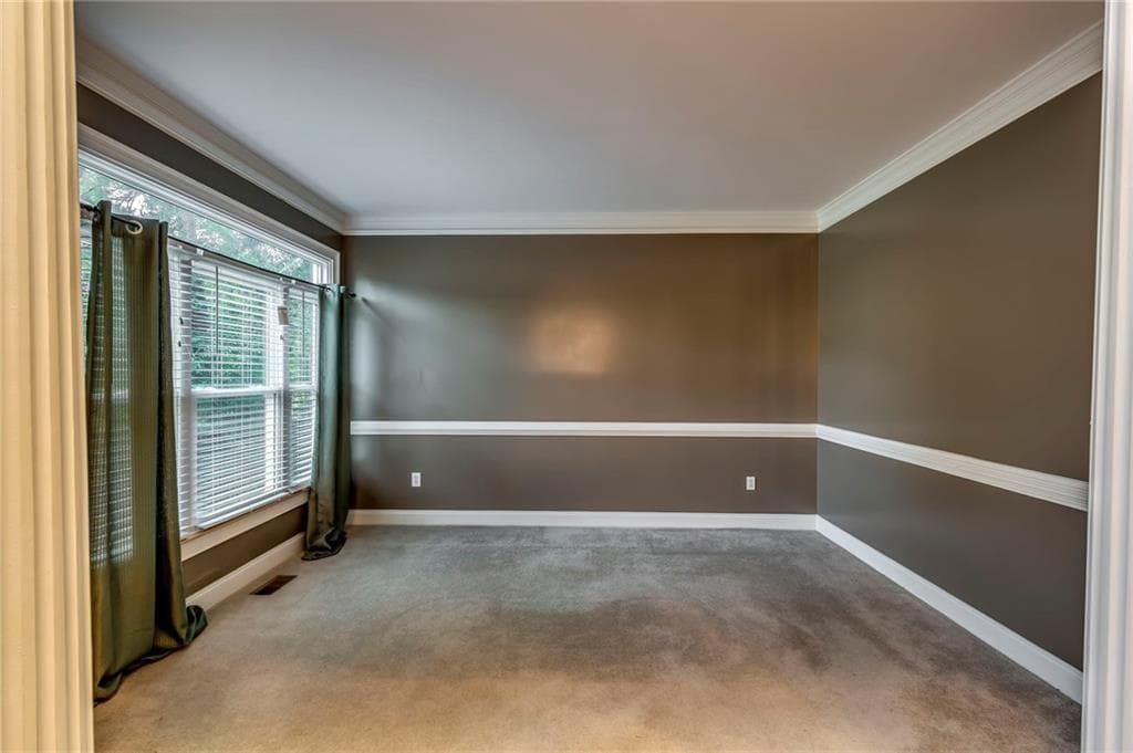 5 bedroom, 4 bathroom, 3,699 sq ft single family residence for sale at 807 Reagan Drive, Conyers, GA 30012 — photo 7