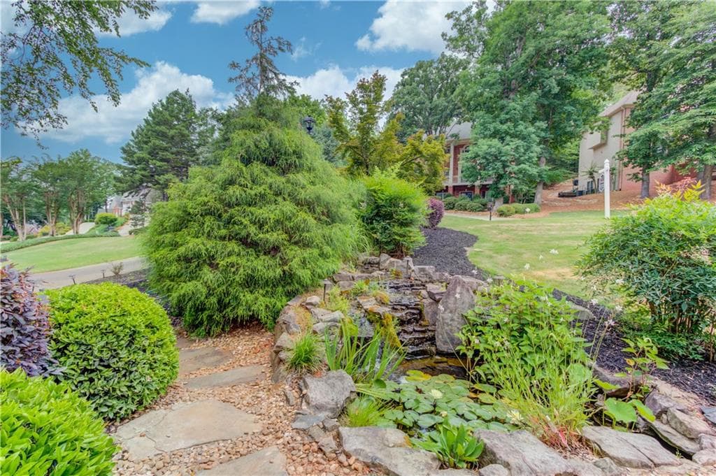 6 bedroom, 5 bathroom, 4,624 sq ft single family residence for rent at 1920 Woods River Lane, Duluth, GA 30097 for $4,200 a month — photo 4