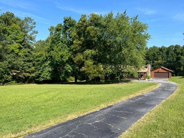 3 bedroom, 2 bathroom single family residence under contract at 3707 Thompson Mill Road, Buford, GA 30519 — photo 3
