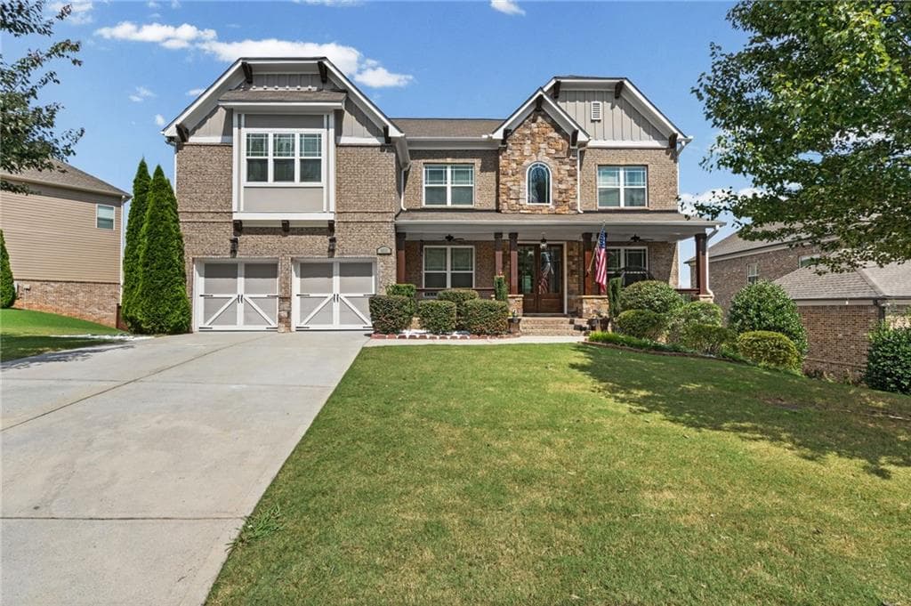 7 bedroom, 6 bathroom, 6,136 sq ft single family residence for sale at 4835 Magnolia Springs Drive, Cumming, GA 30040