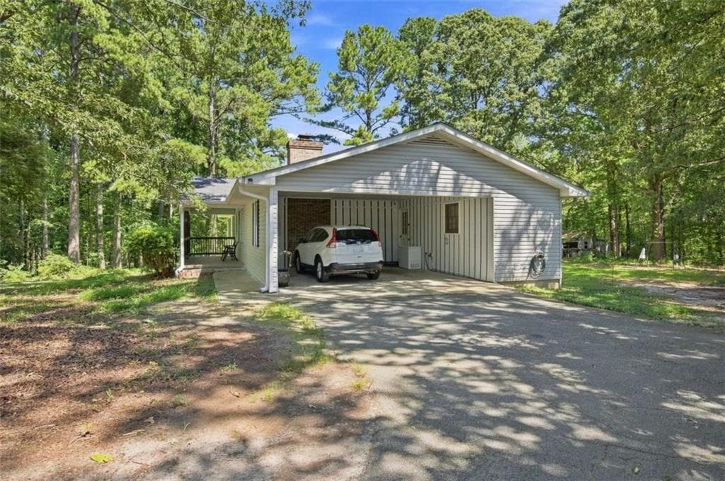 3 bedroom, 2 bathroom, 1,560 sq ft single family residence for sale at 556 Auburn Road, Auburn, GA 30011 — photo 2