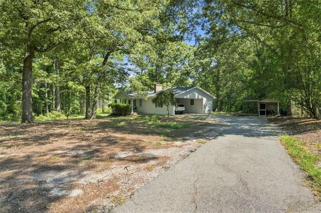3 bedroom, 2 bathroom, 1,560 sq ft single family residence for sale at 556 Auburn Road, Auburn, GA 30011 — photo 4