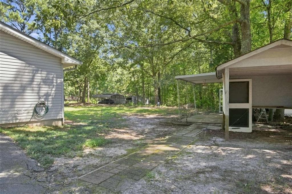 3 bedroom, 2 bathroom, 1,560 sq ft single family residence for sale at 556 Auburn Road, Auburn, GA 30011 — photo 7