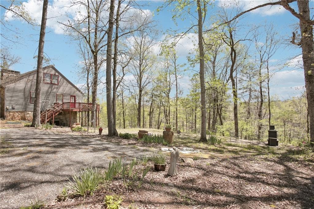 5 bedroom, 4 bathroom, 4,948 sq ft single family residence for sale at 8145 Stone Hill Road, Cumming, GA 30028 — photo 8