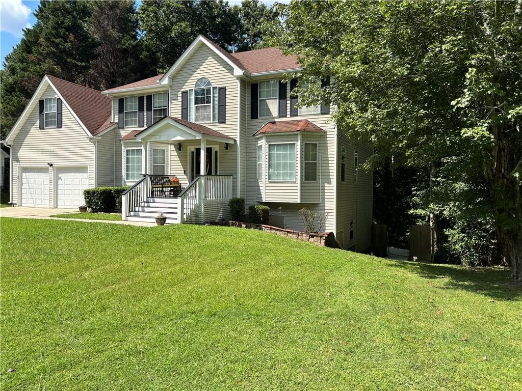 6 bedroom, 4 bathroom, 3,993 sq ft single family residence for sale at 2257 Rocksram Court, Buford, GA 30519 — photo 2