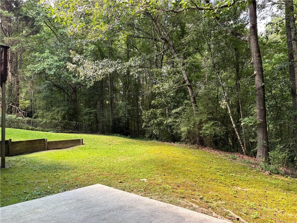 6 bedroom, 4 bathroom, 3,993 sq ft single family residence for sale at 2257 Rocksram Court, Buford, GA 30519 — photo 5