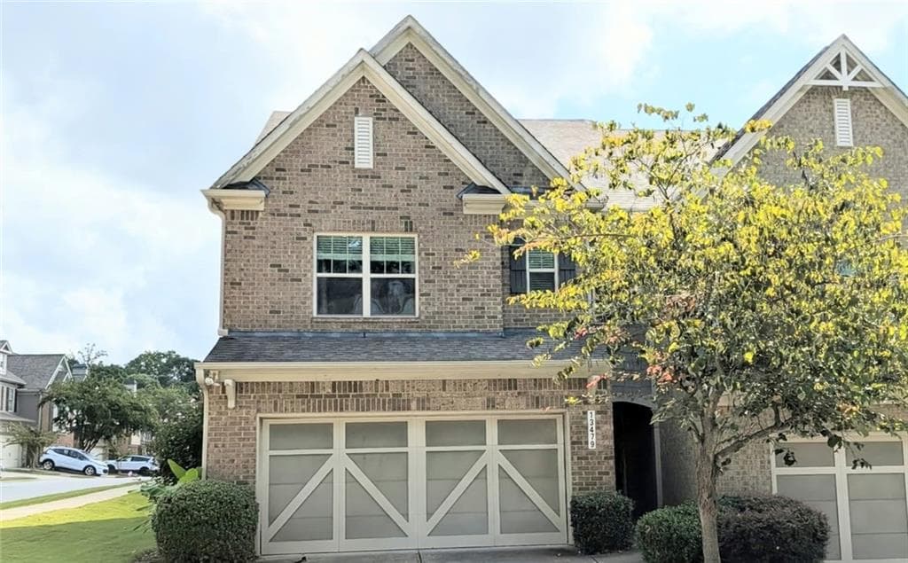 5 bedroom, 4 bathroom, 2,183 sq ft townhouse for sale at 13479 Gardiner Lane, Milton, GA 30004 — photo 1 of 33
