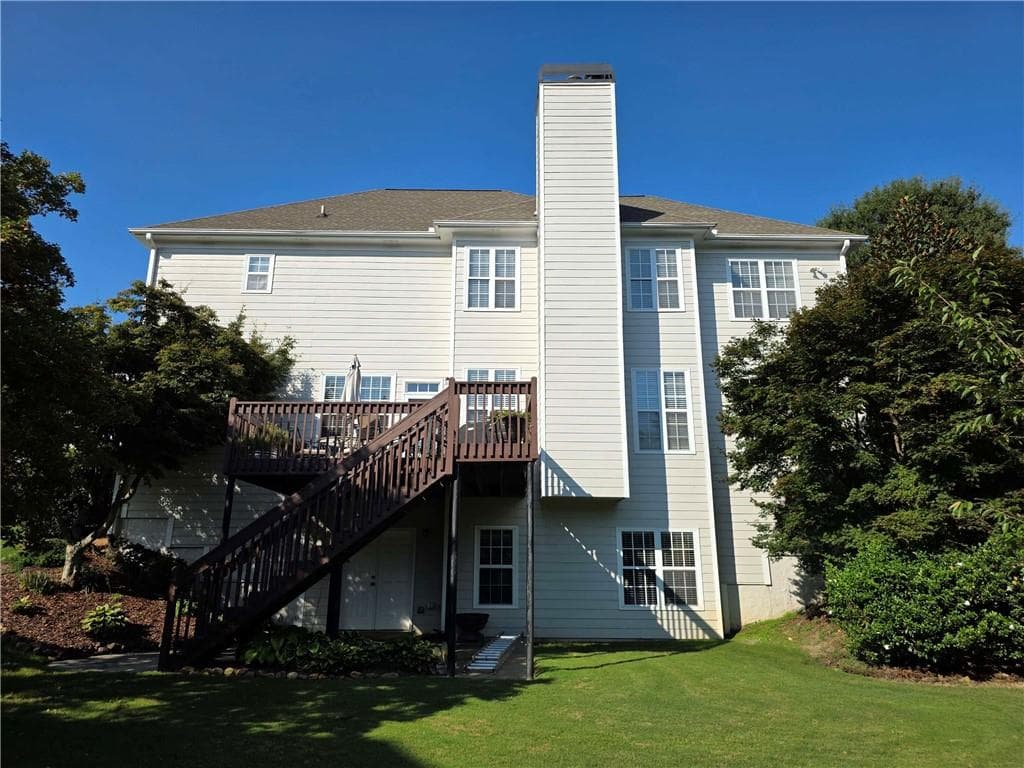5 bedroom, 3 bathroom, 3,403 sq ft single family residence for sale at 3285 Emma Marie Place, Buford, GA 30519 — photo 4