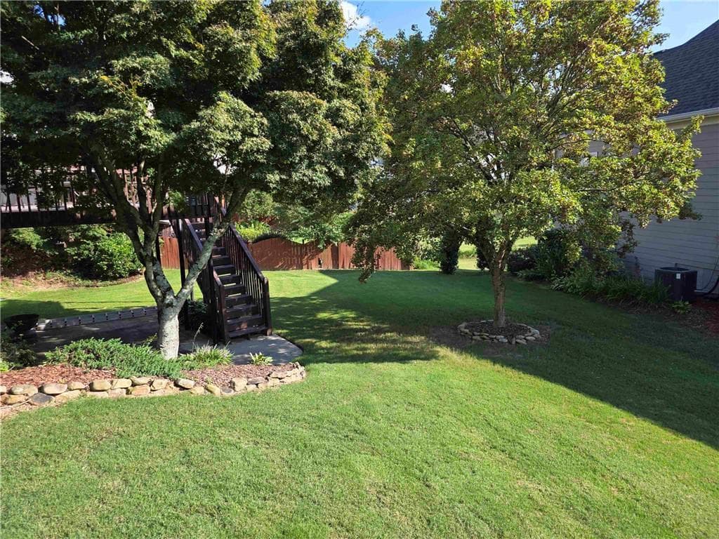 5 bedroom, 3 bathroom, 3,403 sq ft single family residence for sale at 3285 Emma Marie Place, Buford, GA 30519 — photo 6