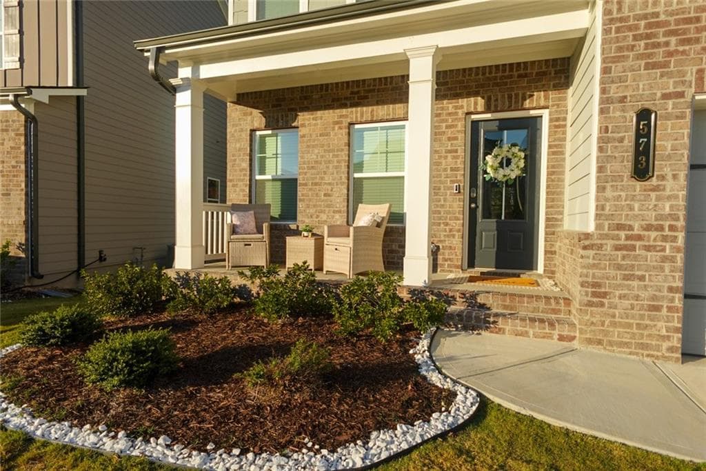 5 bedroom, 3 bathroom, 2,290 sq ft single family residence for sale at 573 Auburn Crossing Drive, Auburn, GA 30011 — photo 2