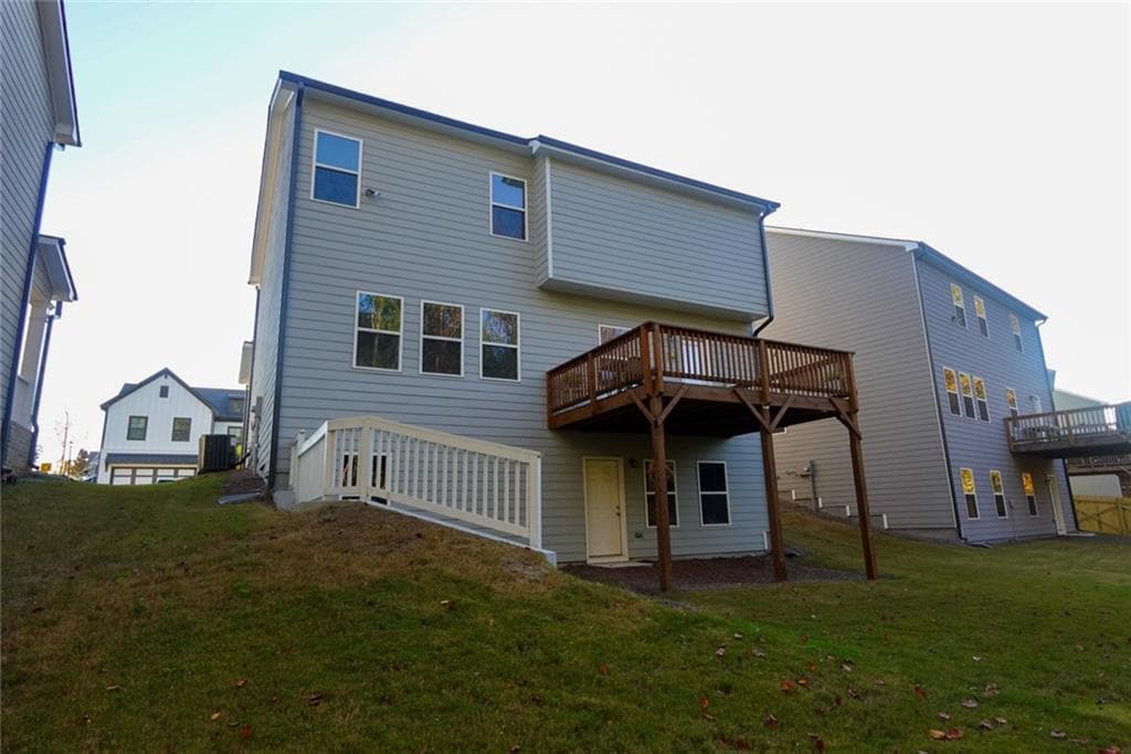 5 bedroom, 3 bathroom, 2,290 sq ft single family residence for sale at 573 Auburn Crossing Drive, Auburn, GA 30011 — photo 7