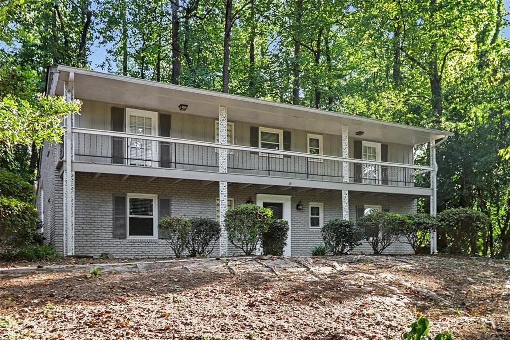 4 bedroom, 3 bathroom, 2,497 sq ft single family residence for sale at 1545 Old Spring House Lane, Atlanta, GA 30338