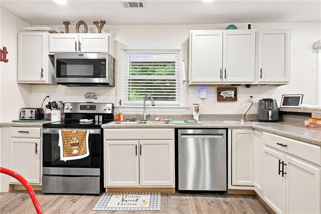 3 bedroom, 2 bathroom, 1,392 sq ft single family residence for sale at 584 Church Road, Calhoun, GA 30701 — photo 4