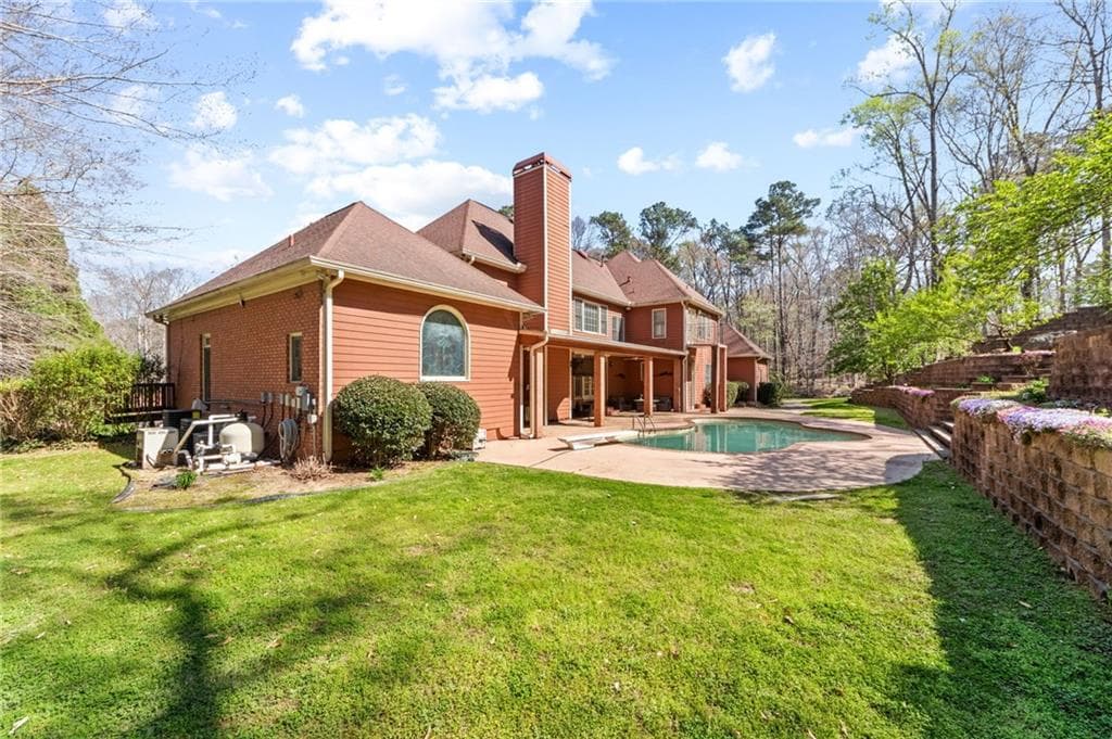 6 bedroom, 7 bathroom, 7,552 sq ft single family residence for sale at 4680 Hamden Forest Drive, Atlanta, GA 30331 — photo 5