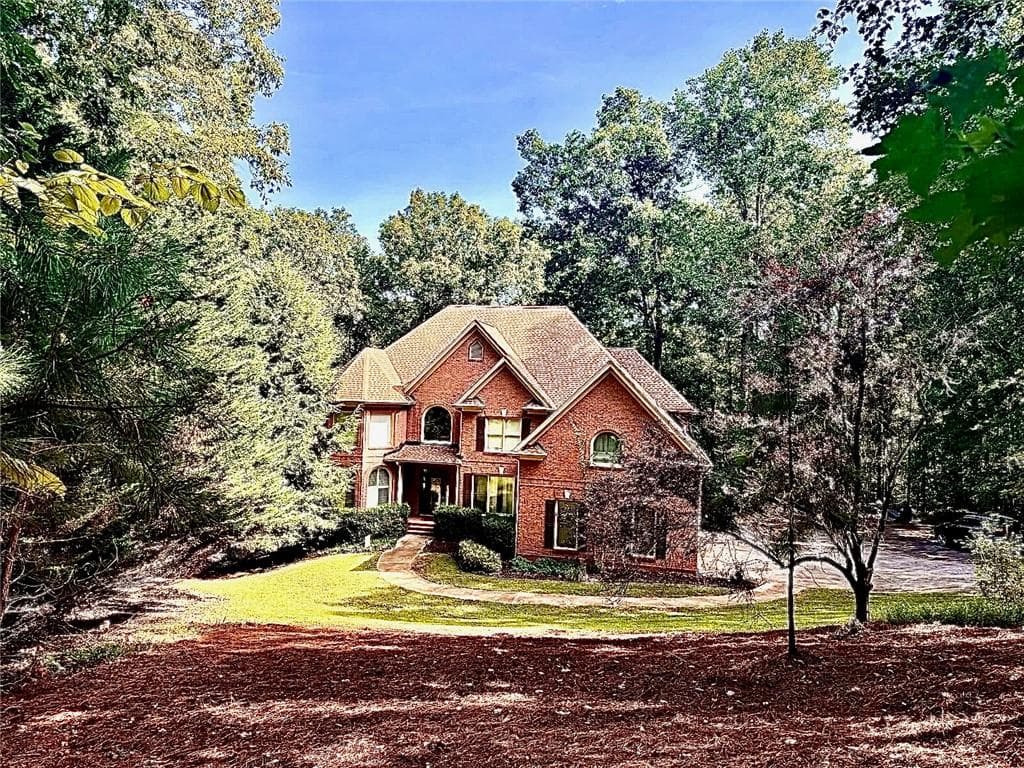 6 bedroom, 5 bathroom, 5,855 sq ft single family residence for sale at 8350 Jacobs Ridge Lane, Cumming, GA 30028