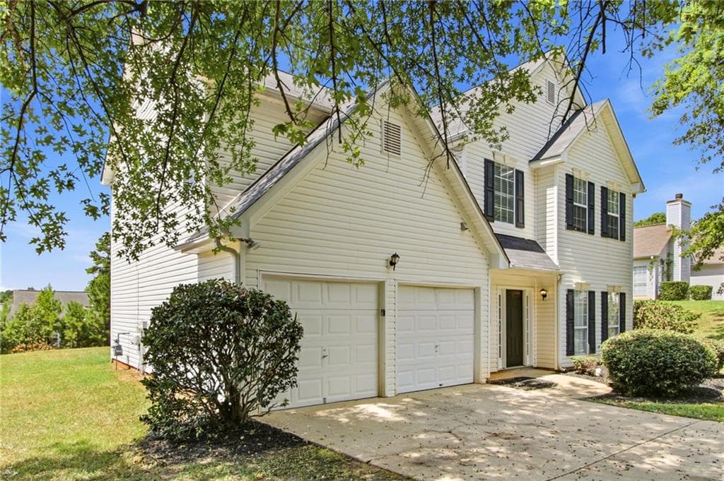 4 bedroom, 3 bathroom, 2,150 sq ft single family residence for sale at 4387 Wheaton Way, Snellville, GA 30039 — photo 2