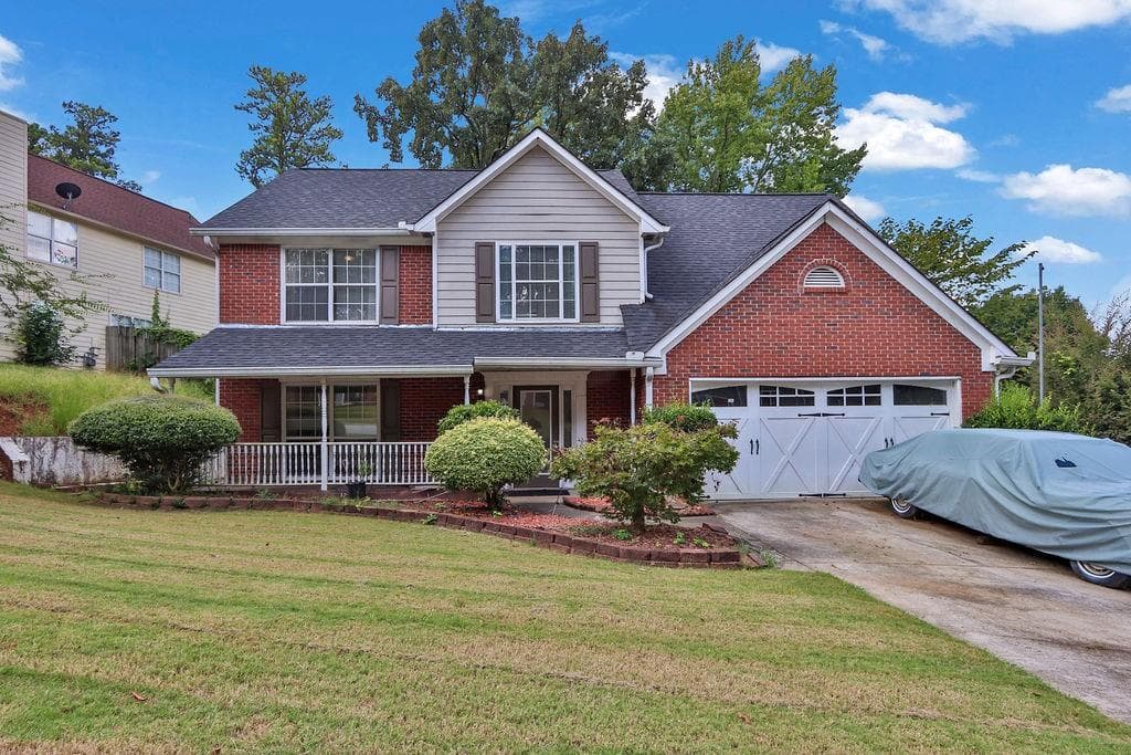 5 bedroom, 4 bathroom, 2,072 sq ft single family residence for sale at 3245 Shady Woods Circle, Lawrenceville, GA 30044 — photo 1 of 33