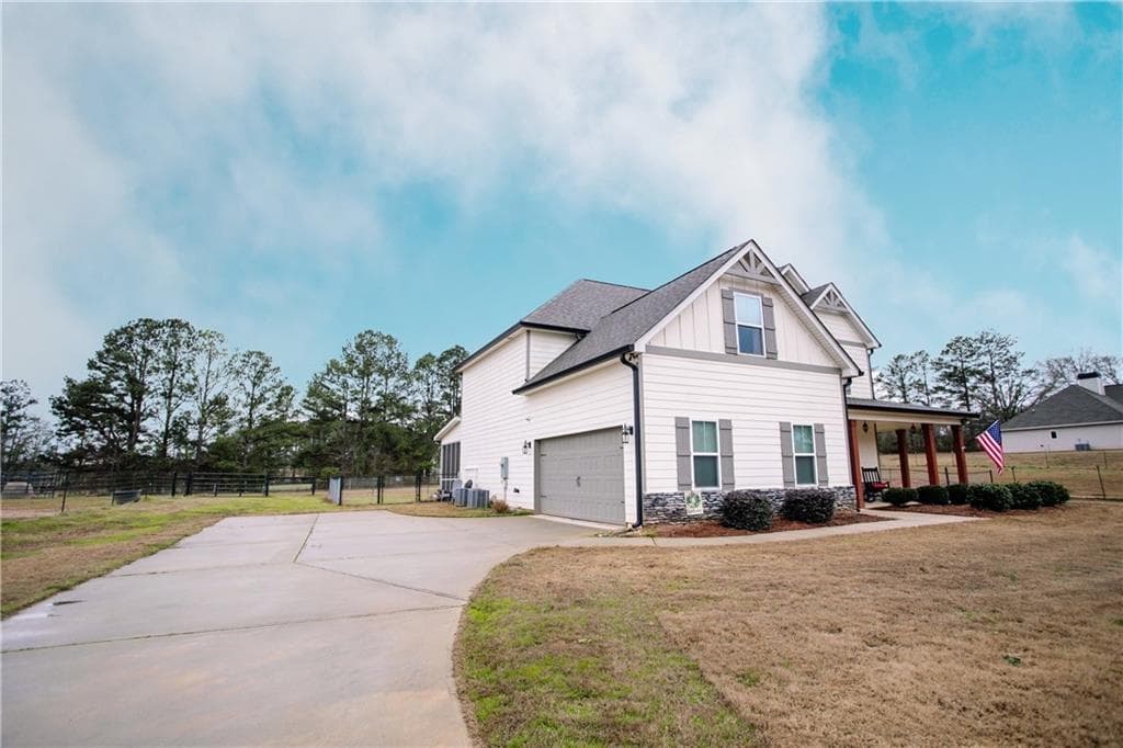 4 bedroom, 4 bathroom, 2,461 sq ft single family residence for sale at 3221 Hollonville Road, Williamson, GA 30292 — photo 2