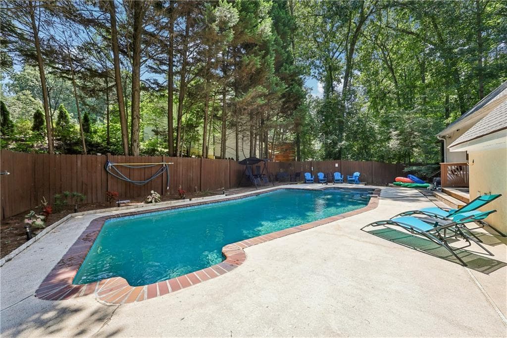 5 bedroom, 5 bathroom, 4,170 sq ft single family residence for sale at 4235 Heather Way, Cumming, GA 30041 — photo 2