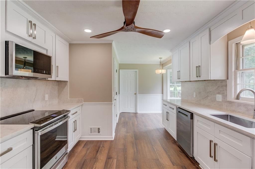 4 bedroom, 3 bathroom, 3,292 sq ft single family residence for sale at 4461 S Roberts Drive, Sugar Hill, GA 30518 — photo 5