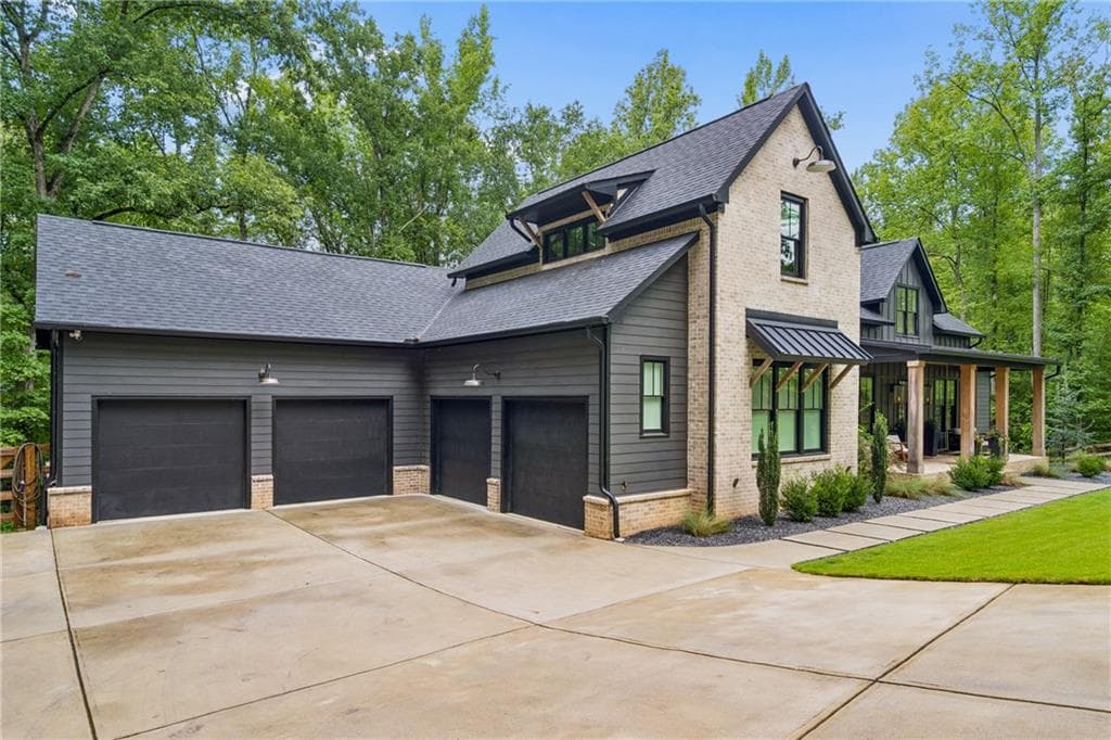 5 bedroom, 6 bathroom, 6,942 sq ft single family residence for sale at 5676 Kennedy Road, Suwanee, GA 30024 — photo 2