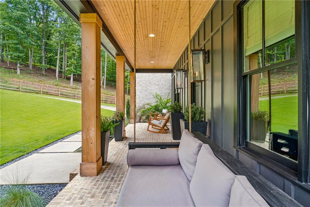 5 bedroom, 6 bathroom, 6,942 sq ft single family residence for sale at 5676 Kennedy Road, Suwanee, GA 30024 — photo 4