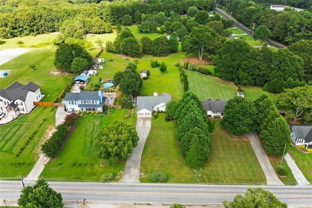 3 bedroom, 2 bathroom, 1,442 sq ft single family residence for sale at 3100 Oak Grove Road, Loganville, GA 30052 — photo 4