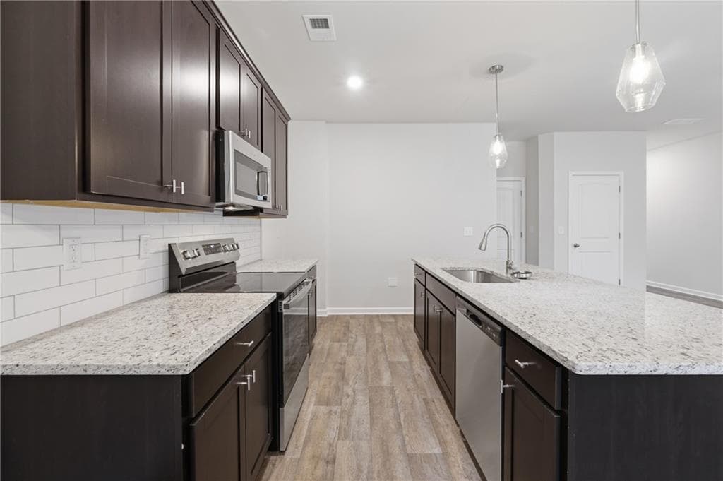 4 bedroom, 3 bathroom, 1,827 sq ft townhouse for sale at 3228 Winding Waters Way, Powder Springs, GA 30127 — photo 9
