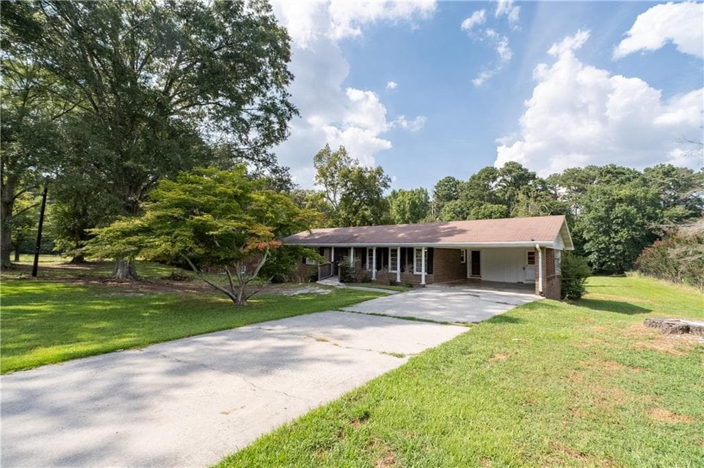 4 bedroom, 2 bathroom, 1,441 sq ft single family residence for sale at 2595 Nevels Road, College Park, GA 30349 — photo 2