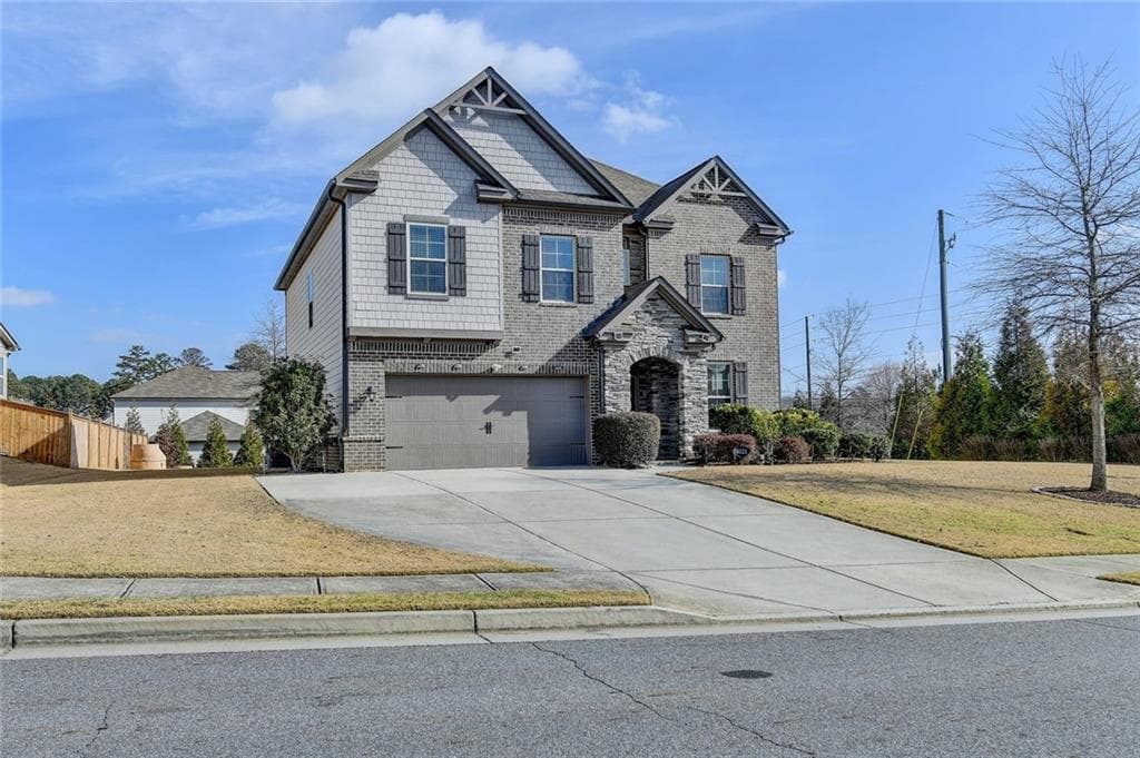 4 bedroom, 3 bathroom, 2,727 sq ft single family residence for sale at 4111 Woodward Walk Lane, Suwanee, GA 30024 — photo 1 of 65
