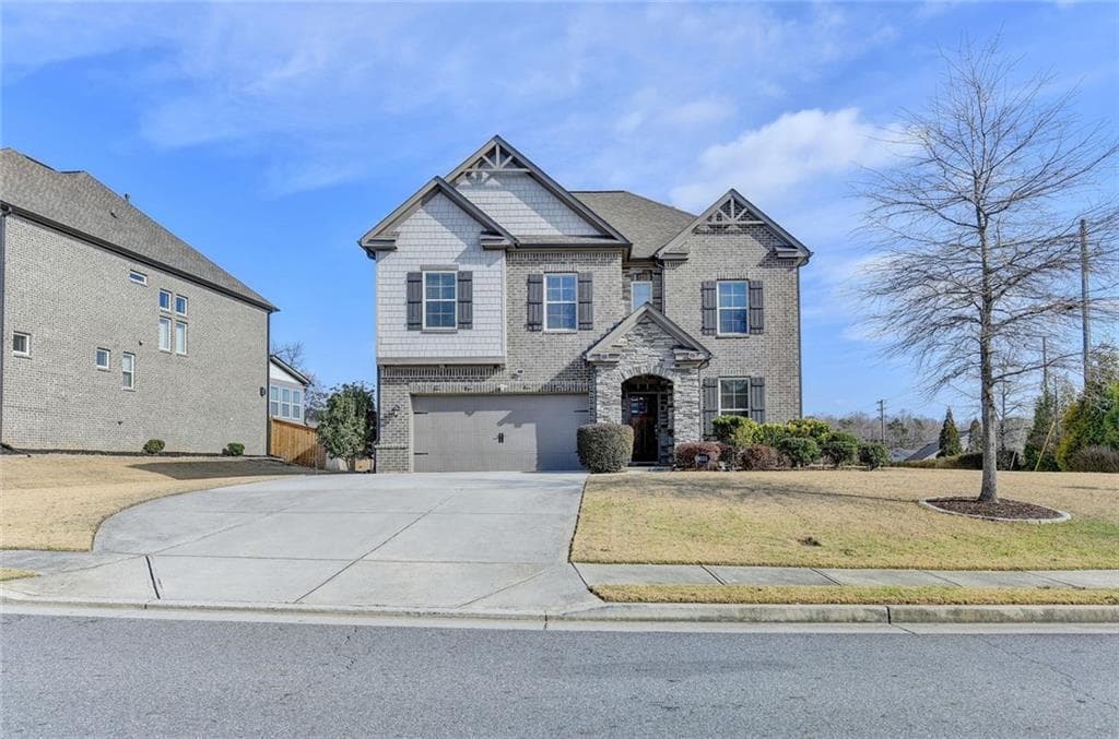 4 bedroom, 3 bathroom, 2,727 sq ft single family residence for sale at 4111 Woodward Walk Lane, Suwanee, GA 30024 — photo 2