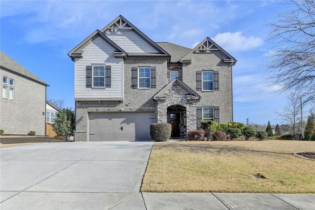 4 bedroom, 3 bathroom, 2,727 sq ft single family residence for sale at 4111 Woodward Walk Lane, Suwanee, GA 30024 — photo 3