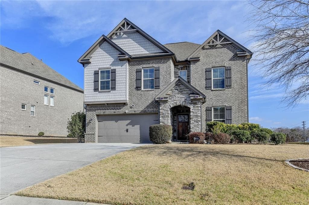 4 bedroom, 3 bathroom, 2,727 sq ft single family residence for sale at 4111 Woodward Walk Lane, Suwanee, GA 30024 — photo 4