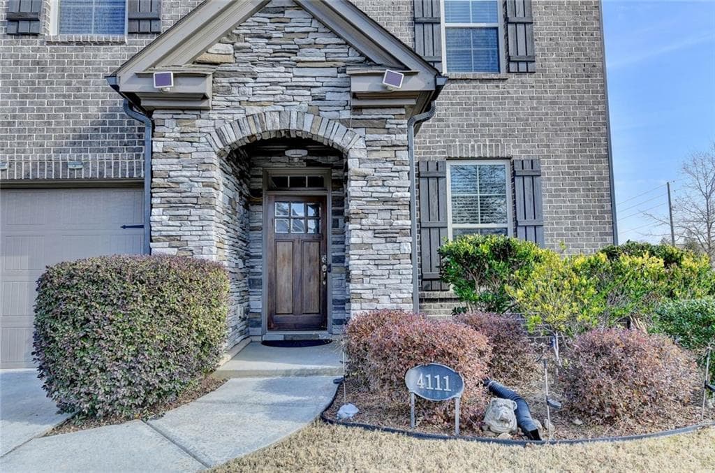 4 bedroom, 3 bathroom, 2,727 sq ft single family residence for sale at 4111 Woodward Walk Lane, Suwanee, GA 30024 — photo 5
