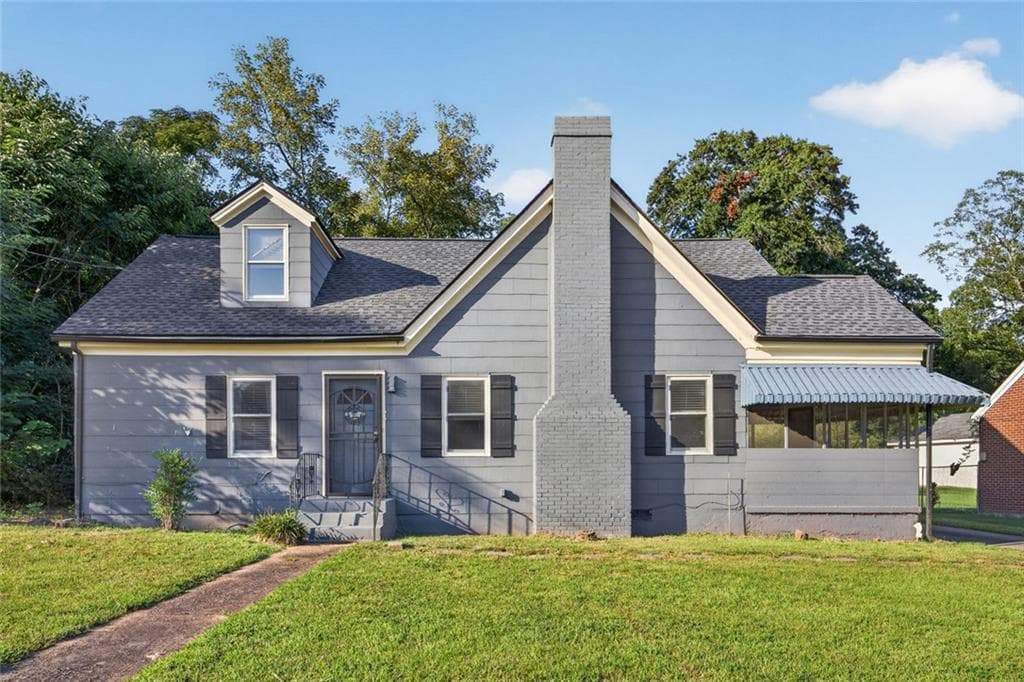 4 bedroom, 2 bathroom, 1,685 sq ft single family residence for sale at 6866 Parkway Drive, Lithonia, GA 30058 — photo 1 of 26