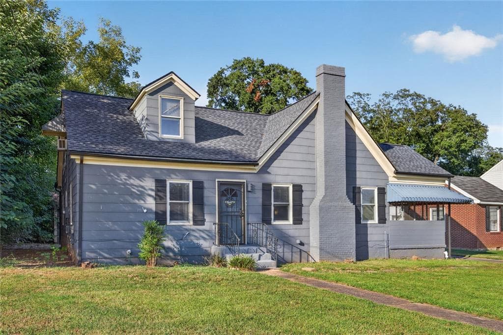 4 bedroom, 2 bathroom, 1,685 sq ft single family residence for sale at 6866 Parkway Drive, Lithonia, GA 30058 — photo 3