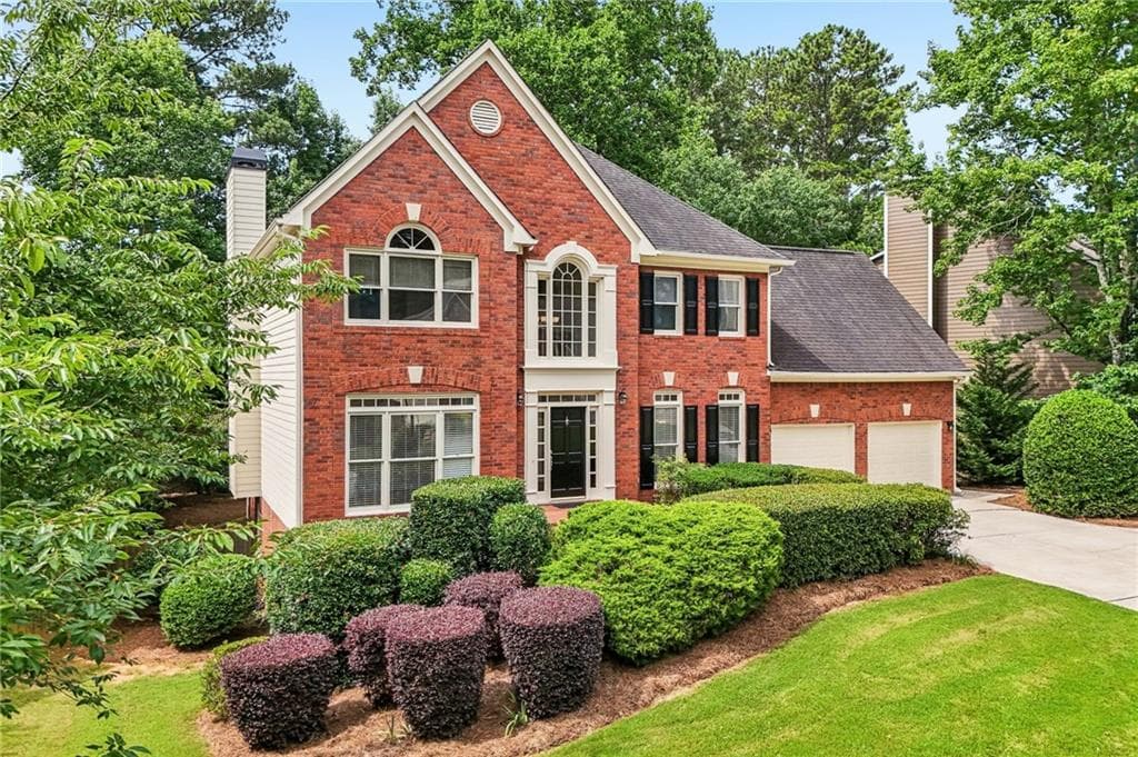 5 bedroom, 4 bathroom, 4,133 sq ft single family residence for sale at 7215 Amberleigh Way, Johns Creek, GA 30097 — photo 2