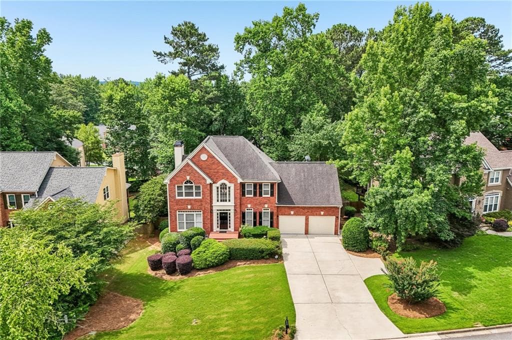 5 bedroom, 4 bathroom, 4,133 sq ft single family residence for sale at 7215 Amberleigh Way, Johns Creek, GA 30097 — photo 3