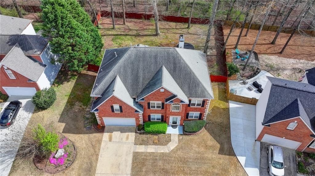 5 bedroom, 4 bathroom, 3,155 sq ft single family residence for sale at 1558 Macy Lane, Lawrenceville, GA 30043 — photo 2