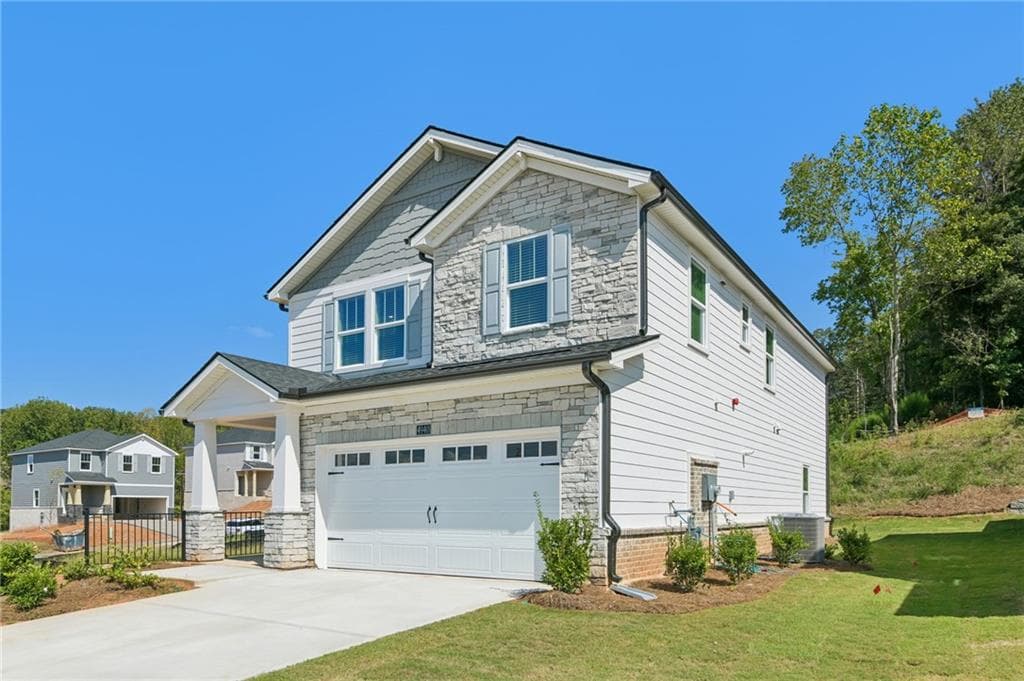 5 bedroom, 3 bathroom, 2,352 sq ft single family residence for sale at 4940 Macomber Lane, Cumming, GA 30041 — photo 5