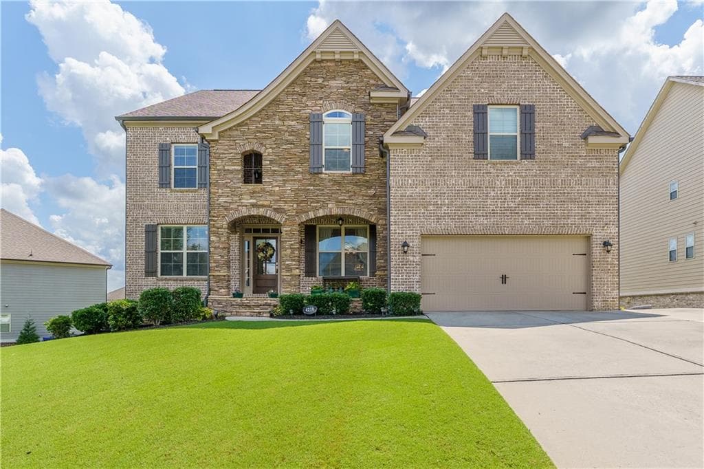 5 bedroom, 4 bathroom, 4,285 sq ft single family residence for sale at 4210 Woodward Walk Lane, Suwanee, GA 30024