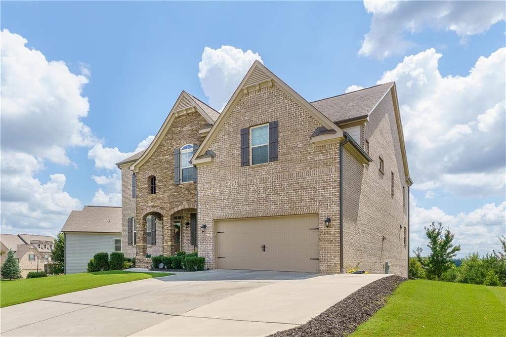 5 bedroom, 4 bathroom, 4,285 sq ft single family residence for sale at 4210 Woodward Walk Lane, Suwanee, GA 30024 — photo 3