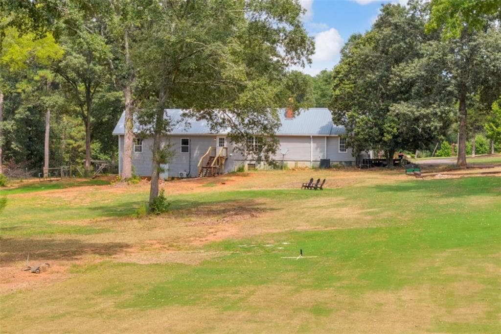 4 bedroom, 3 bathroom, 2,528 sq ft single family residence for sale at 4499 Parkwood Road, Social Circle, GA 30025 — photo 8