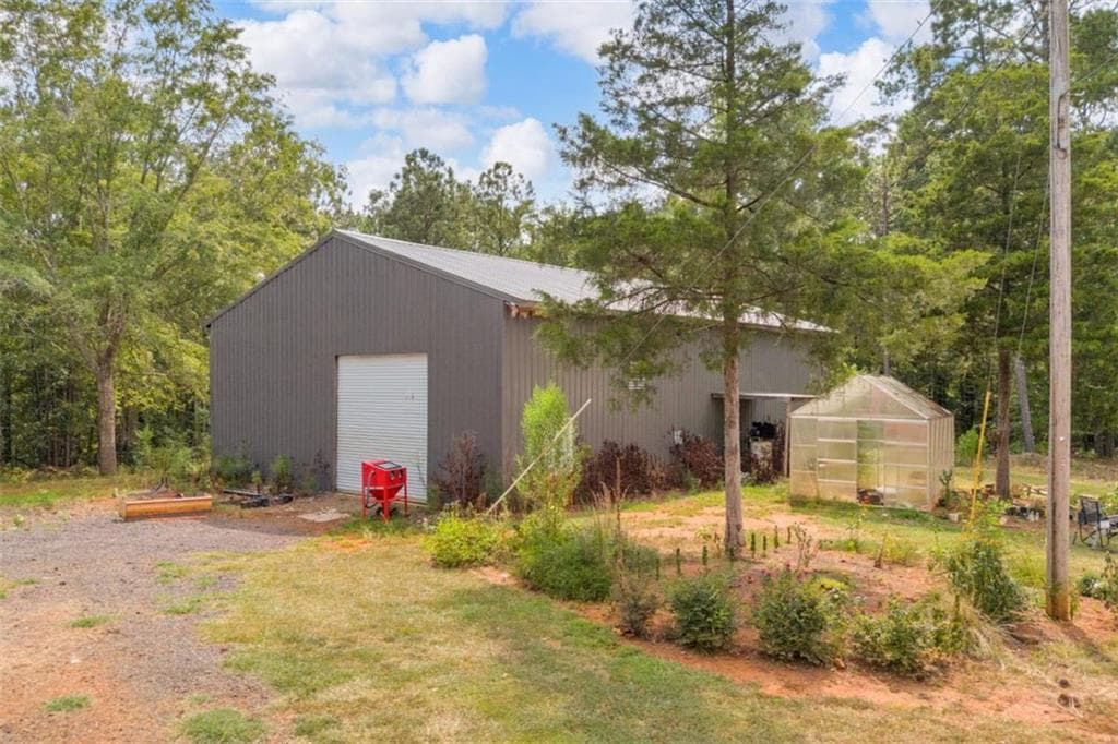 4 bedroom, 3 bathroom, 2,528 sq ft single family residence for sale at 4499 Parkwood Road, Social Circle, GA 30025 — photo 9