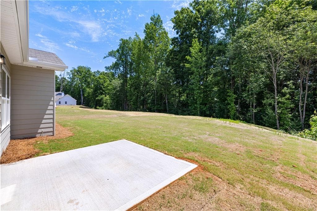 4 bedroom, 3 bathroom, 1,700 sq ft single family residence for sale at 497 Charleston Place, Villa Rica, GA 30180 — photo 2